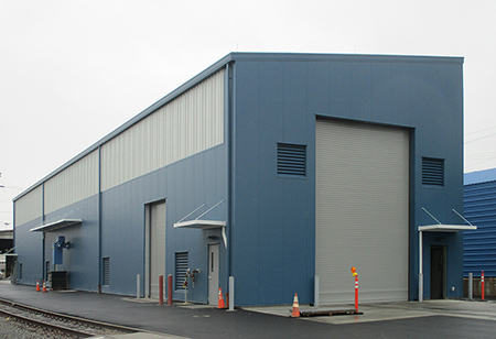 The steel blue LAX maintenance building exterior