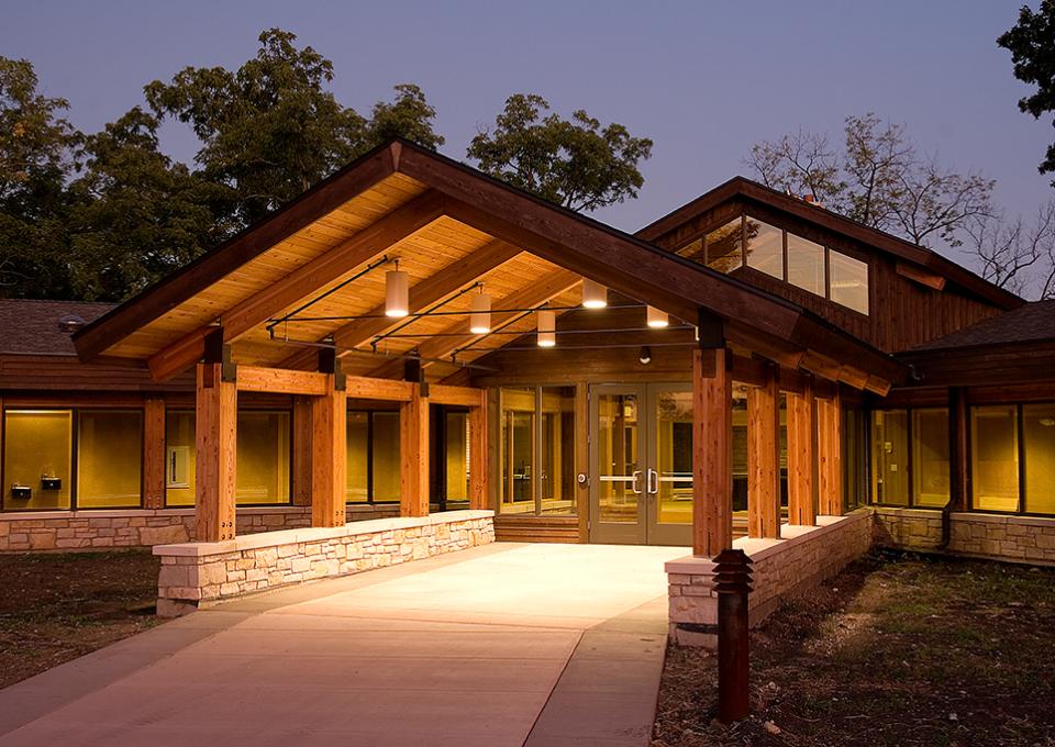 The entranceway is made of heavy wood planks.