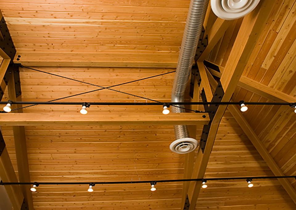 Interior wood planked ceiling.