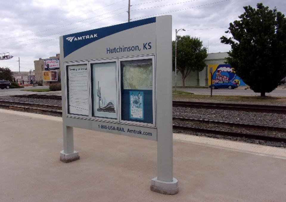 Large platform sign at Hutchinson, KS station