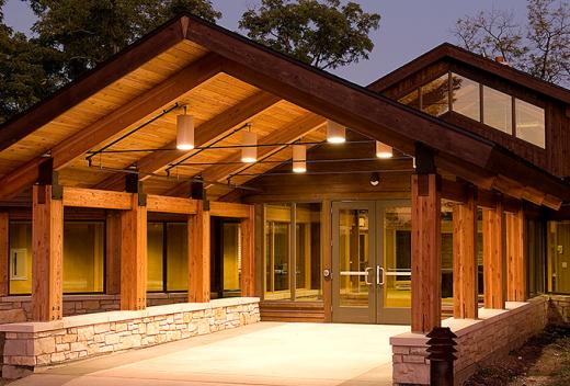 The entranceway is made of heavy wood planks.