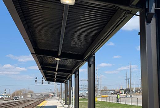 Passenger loading platform with large aluminum awning