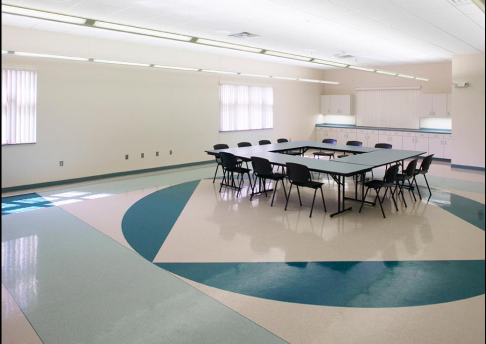 Meeting room with dark and light green pattern