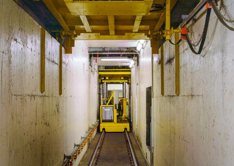 Drop table space under the track that is used for train car maintenance.