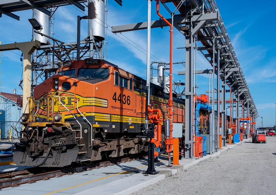 The locomotive car being refueled.