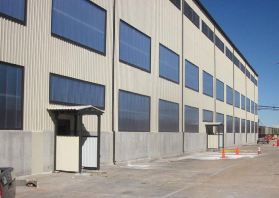 Maintenance building exterior with new metal siding.